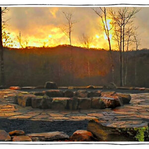 Spectacular gold and orange sunset at Elohee near the stone walkway and circular path